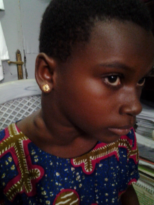 A patient at the KATH cancer clinic awaiting treatment. Image